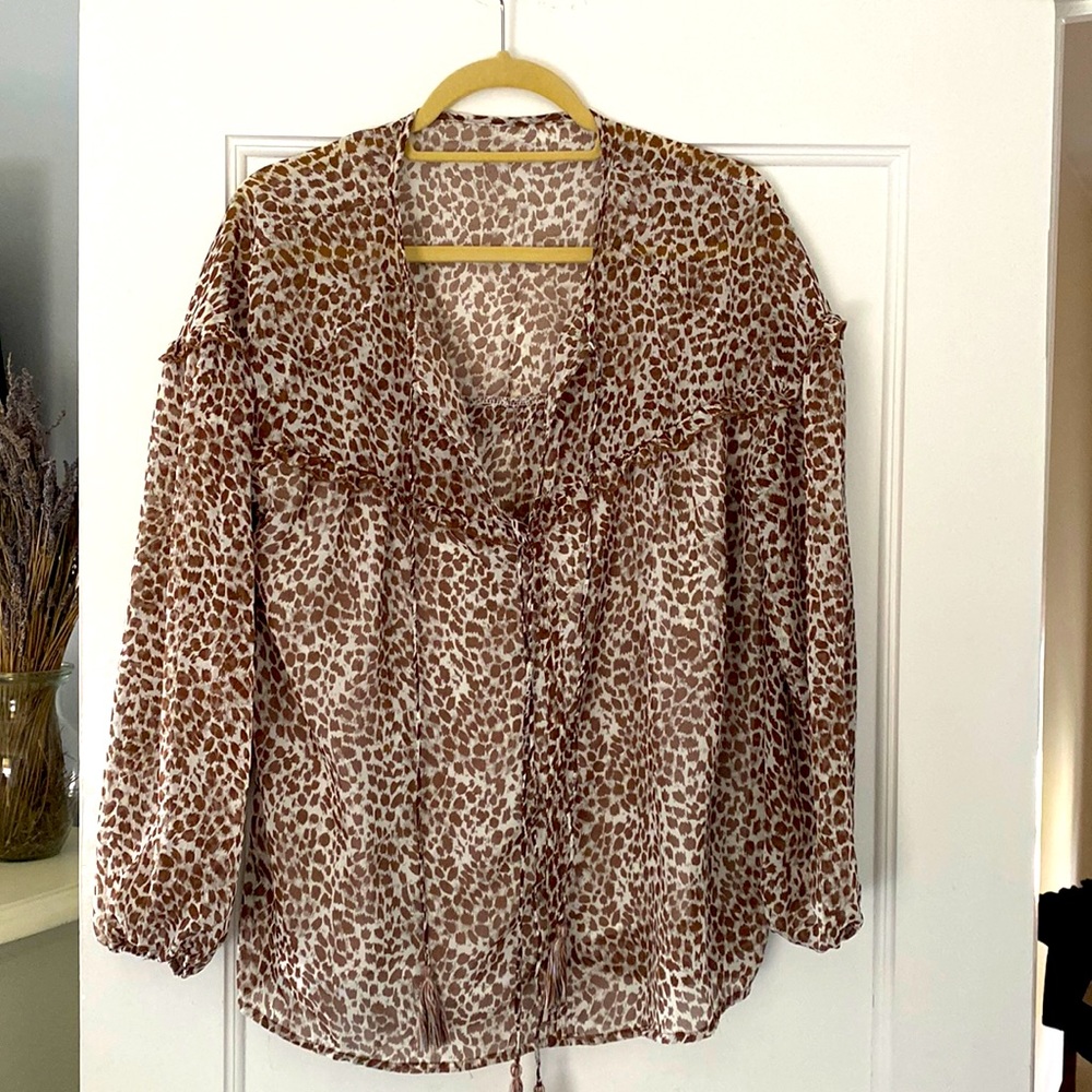 Cheeta blouse   Size large.  With tassels